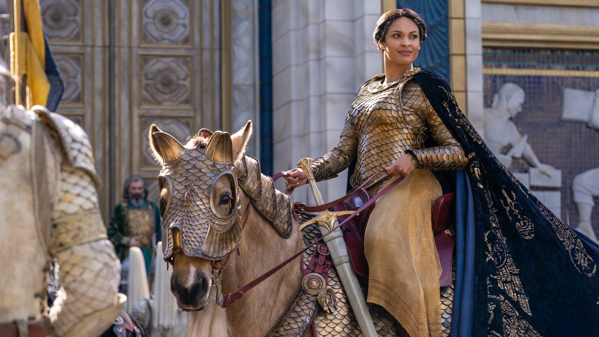 Queen Miriel on horseback as she leads Numenorian soldiers to war in the Southlands