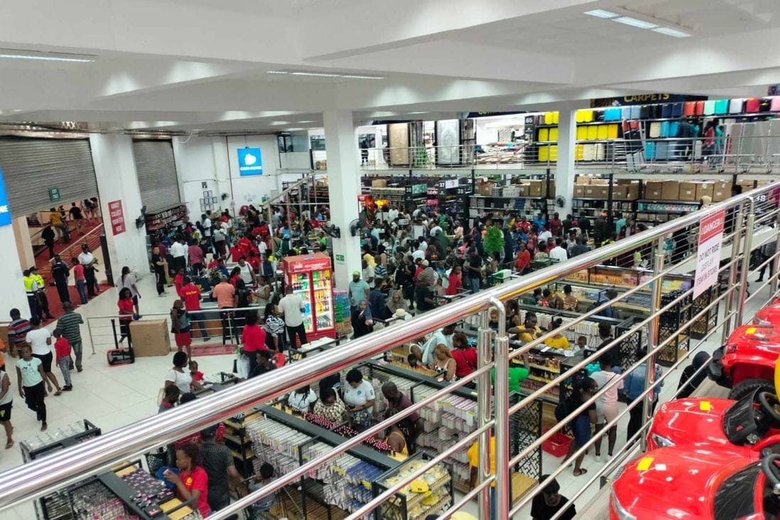 The packed entry to China Square where people are crowded as they flock to the store in huge numbers