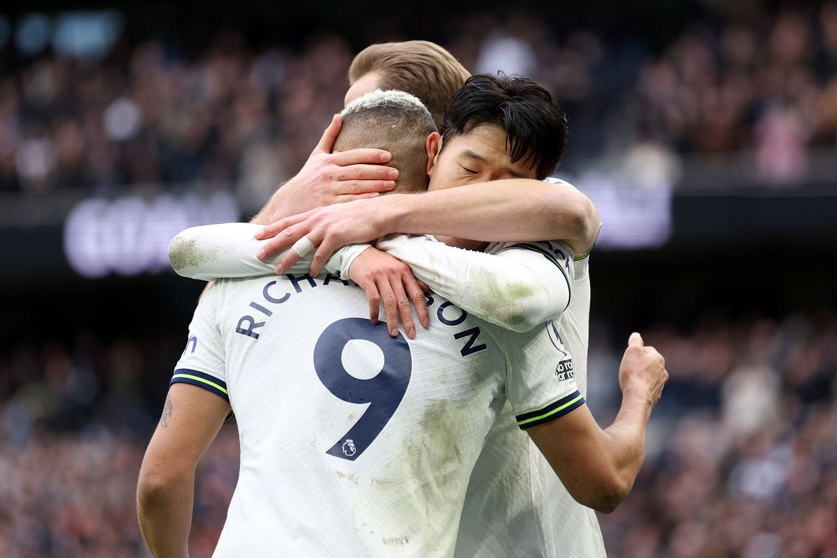 Spurs' Kane, Son, and Richarlison celebrate a goal with a warm embrace