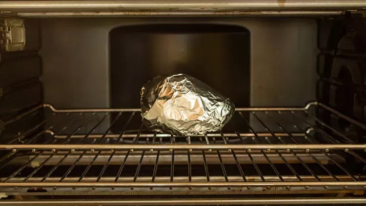 You can ripen an avocado in the oven by wrapping it in foil and heating it at 200 degrees Fahrenheit