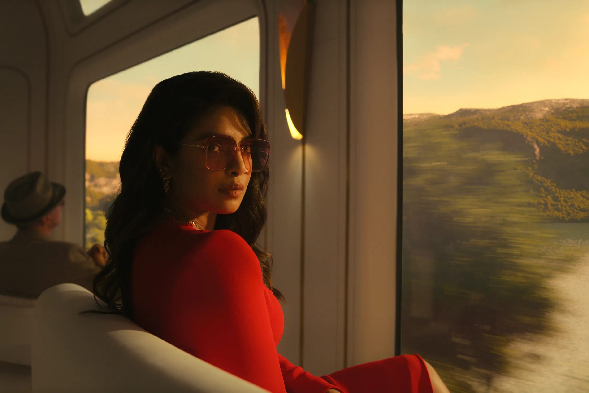 Nadia on the train in Italy as they try to stop a seller carrying uranium.