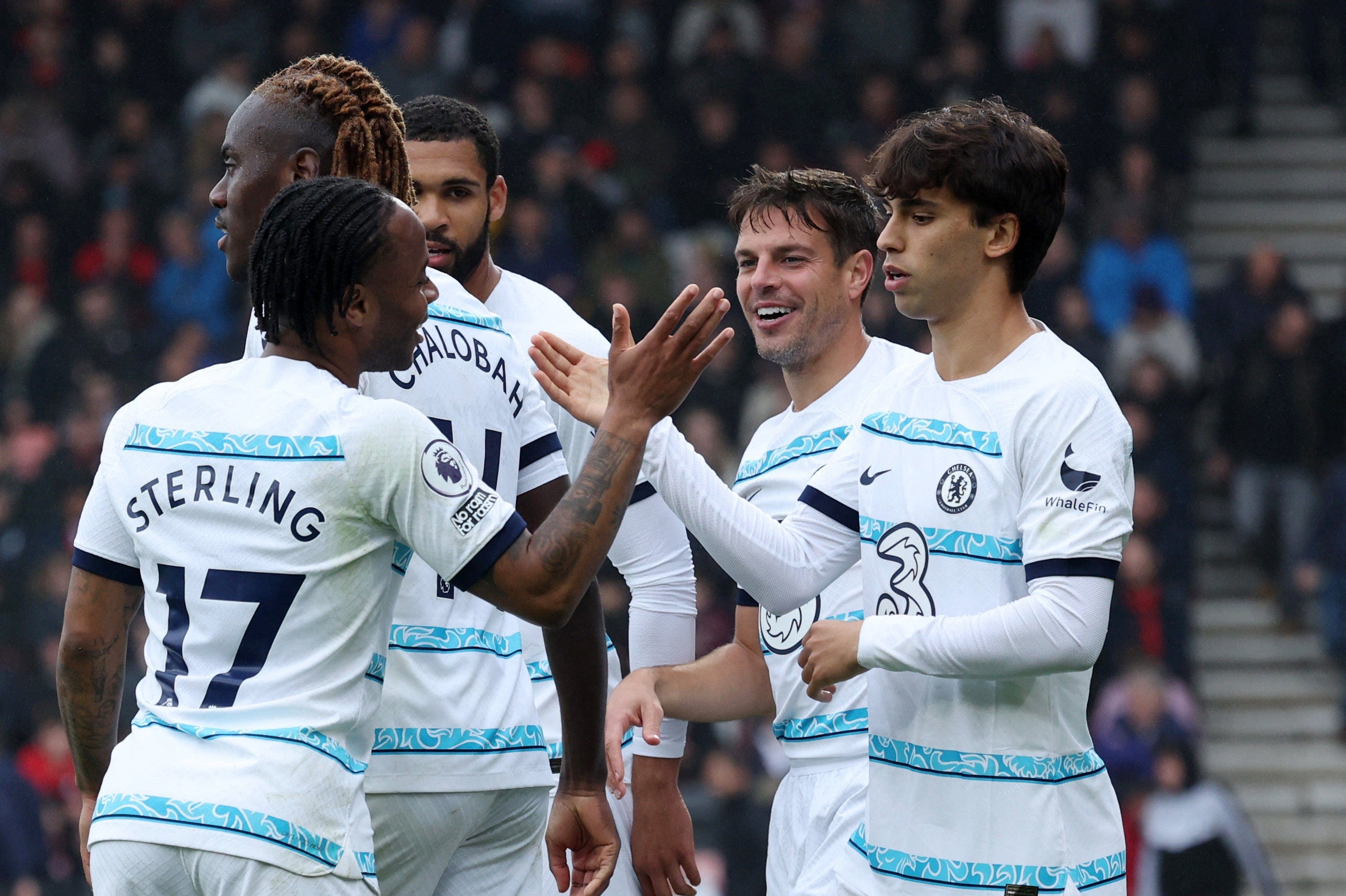 Chelsea's players Joao Felix and Raheem Sterling celebrate a goal as Chelsea beat Bournemouth 3-1 in EPL Gameweek 35