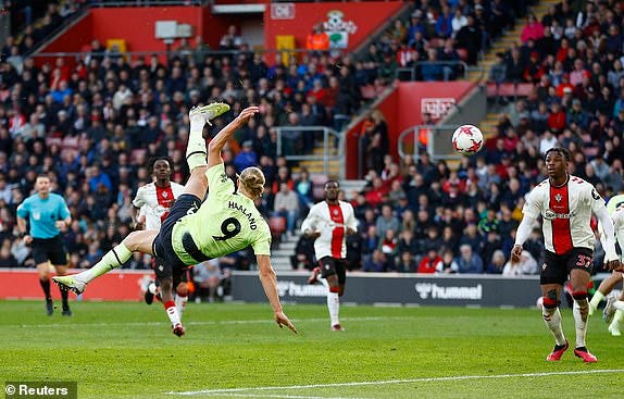 Erling Haaland doing a fly-kick as he scored his second goal against Southampton