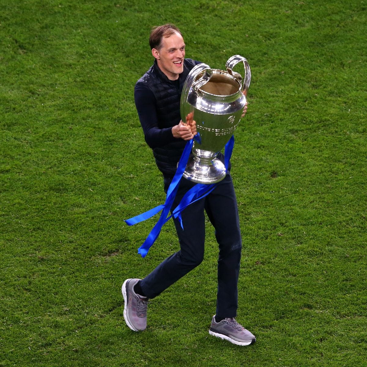 Thomas Tuchel holding the UCL Trophy