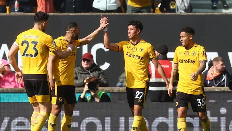 Matheus Nunes celebrating his goal against Chelsea with his teammates