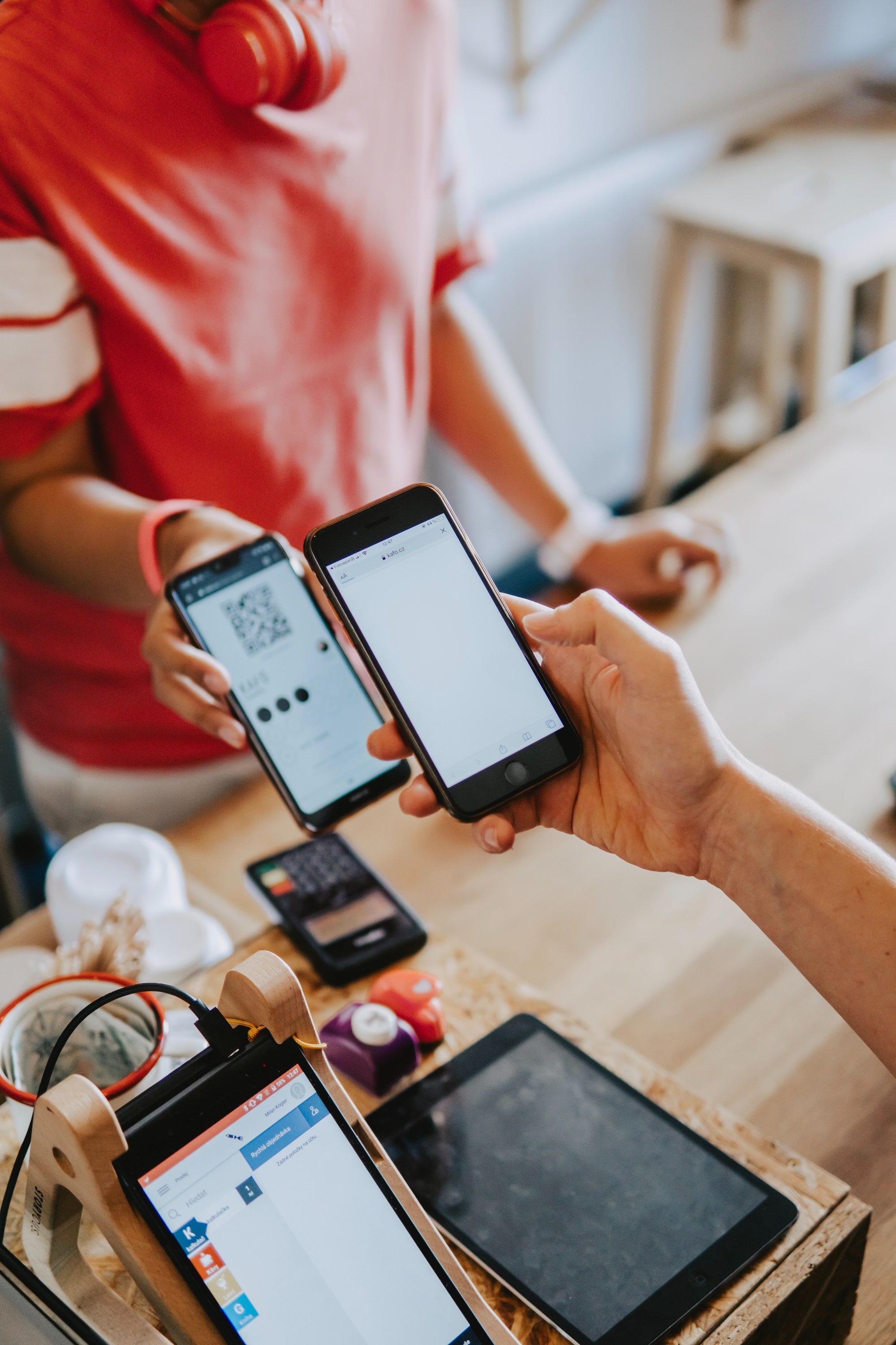 A customer trying to pay via scanning a QR code