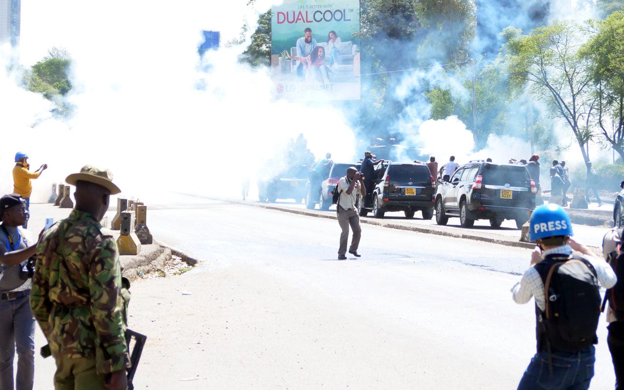 The Azimio motorcade being rained on with teargas as they left for the protests