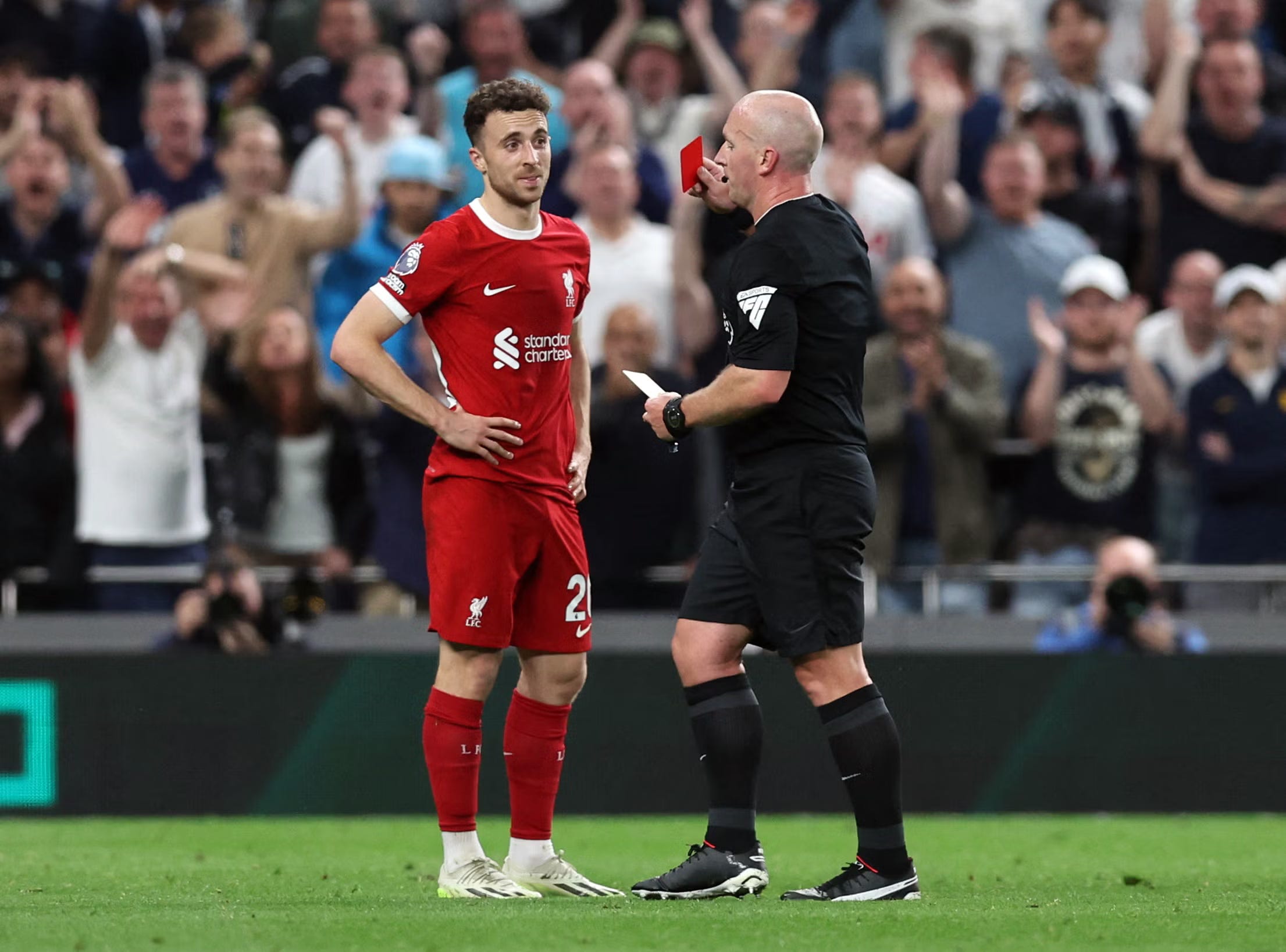 Diogo Jota being shown a red card