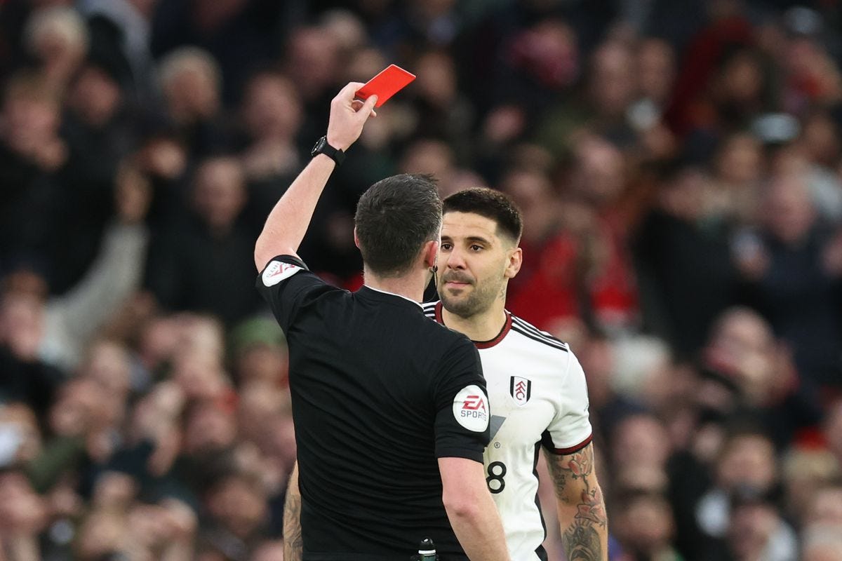 Fulham's Aleksandar Mitrovic being shown a red card