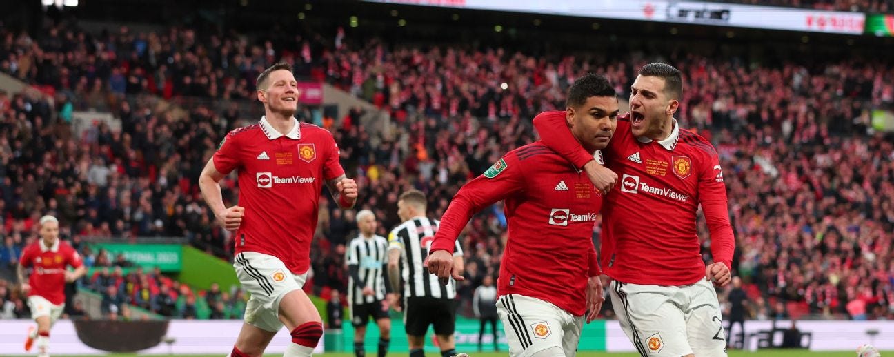 Man Utd player Casemiro celebrating his goal against Newcastle United alongside two of his teammates