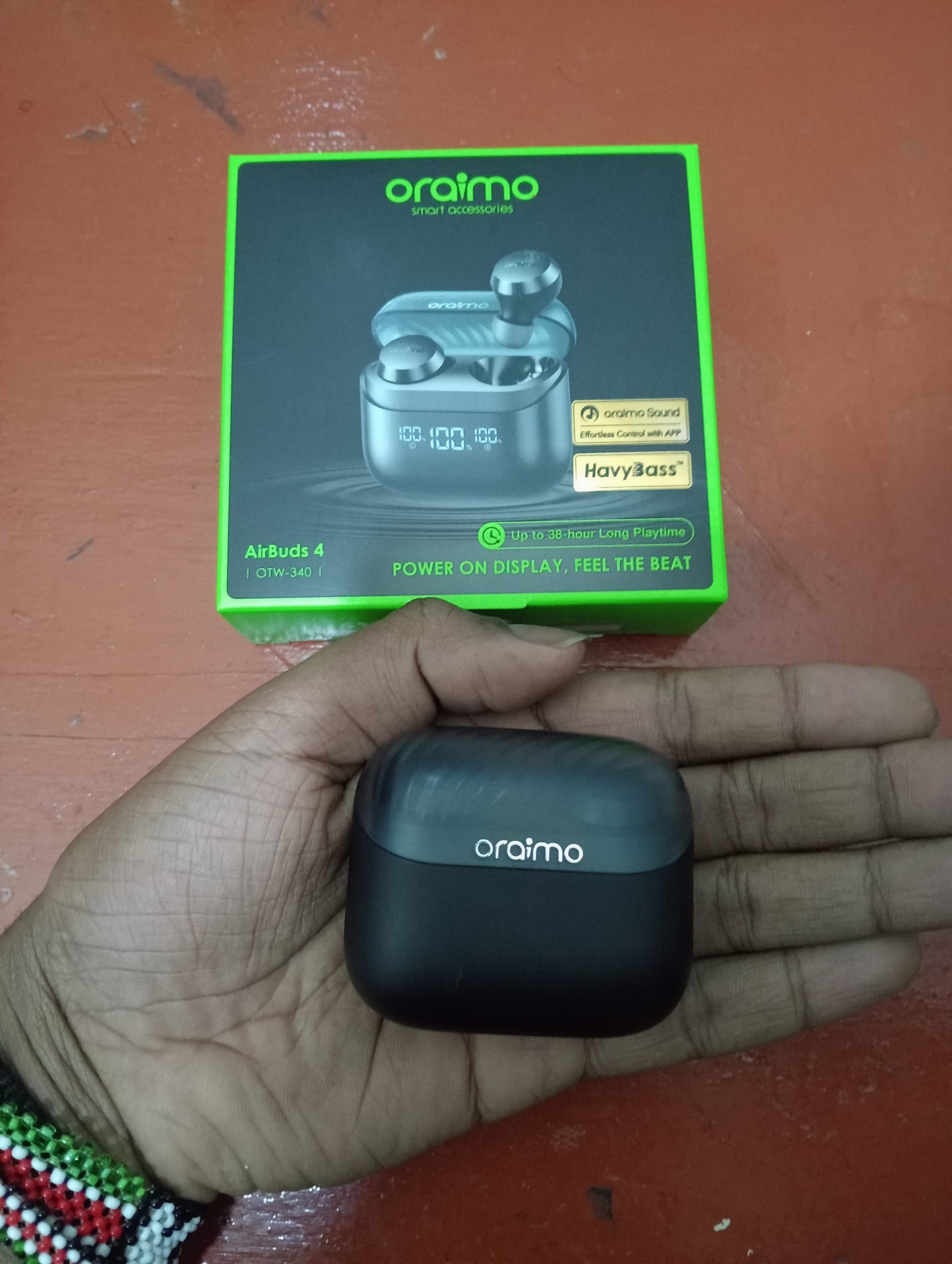 The charging case of the Oraimo Airbuds 4 TWS Earbuds is small and will easily fit in the palm of your hand | Oraimo Airbuds 4 ENC TWS Earbuds Review