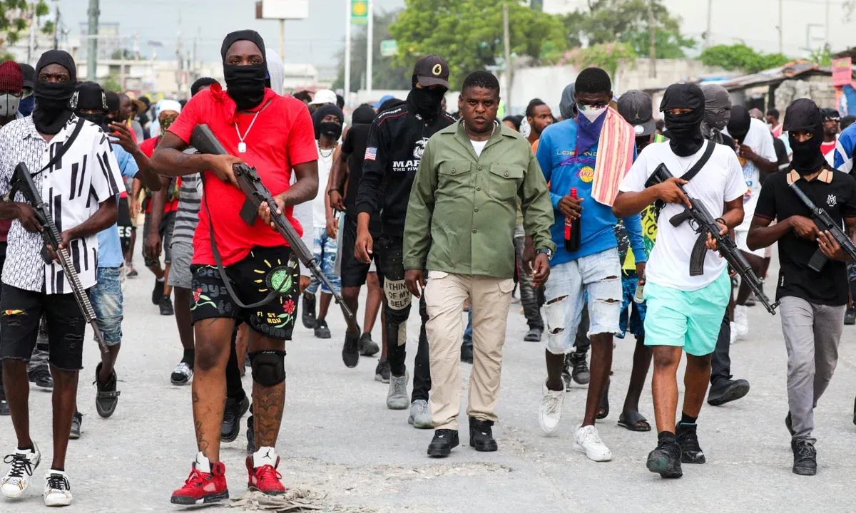 Haiti's most notorious gang leader Jimmy “Barbecue” Cherizier | Root Causes of Haiti's Instability: A Deep Dive into The Rise of Gangs and Insecurity in Haiti | Mania News