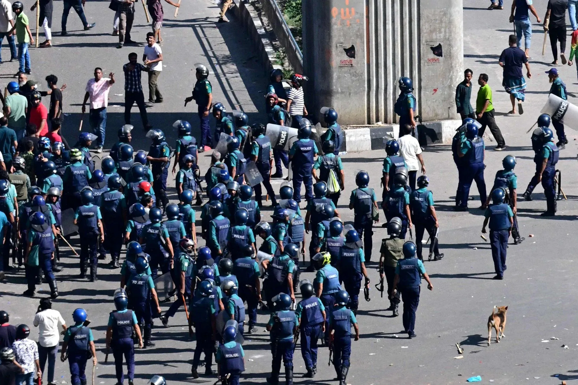 Bangladeshi police trying to quell protests during anti-government student-led demonstrations | Political Earthquake Rocks Bangladesh: The Aftermath of PM Sheikh Hasina's Shocking Resignation and Exile | Mania Politics