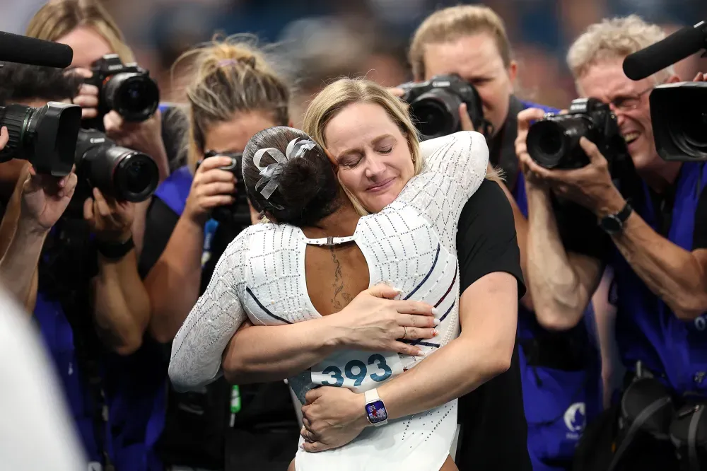 Chiles hugging her coach Cecile Landi | The Controversial Decision: Why Was Jordan Chiles' Bronze Medal Stripped Amidst Appeal Timing Controversy? | Mania News