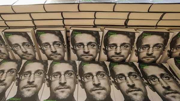 A photo of Edward Snowden on book covers