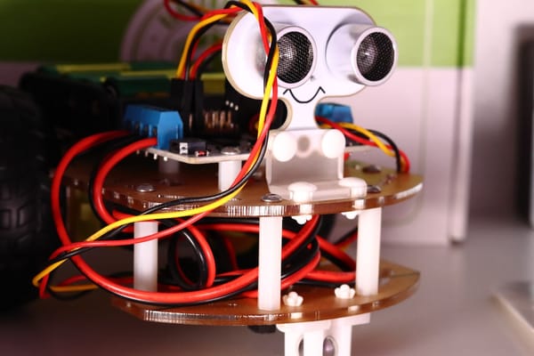 a robot made out of electronics and wires