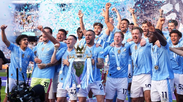 Man City player lifting the Premier League 2023-24 trophy | Man City News | PL Updates | Mania Africa