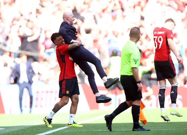 Antony lifts Erik ten Hag in celebration after Man United beat Man City to win the FA Cup 2024 | FA Final News | Mania Africa