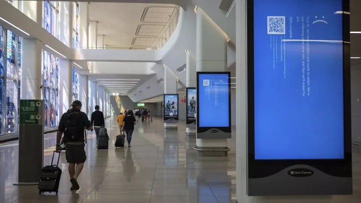 'Blue screen of death' on airport monitors following global IT outage yesterday | 